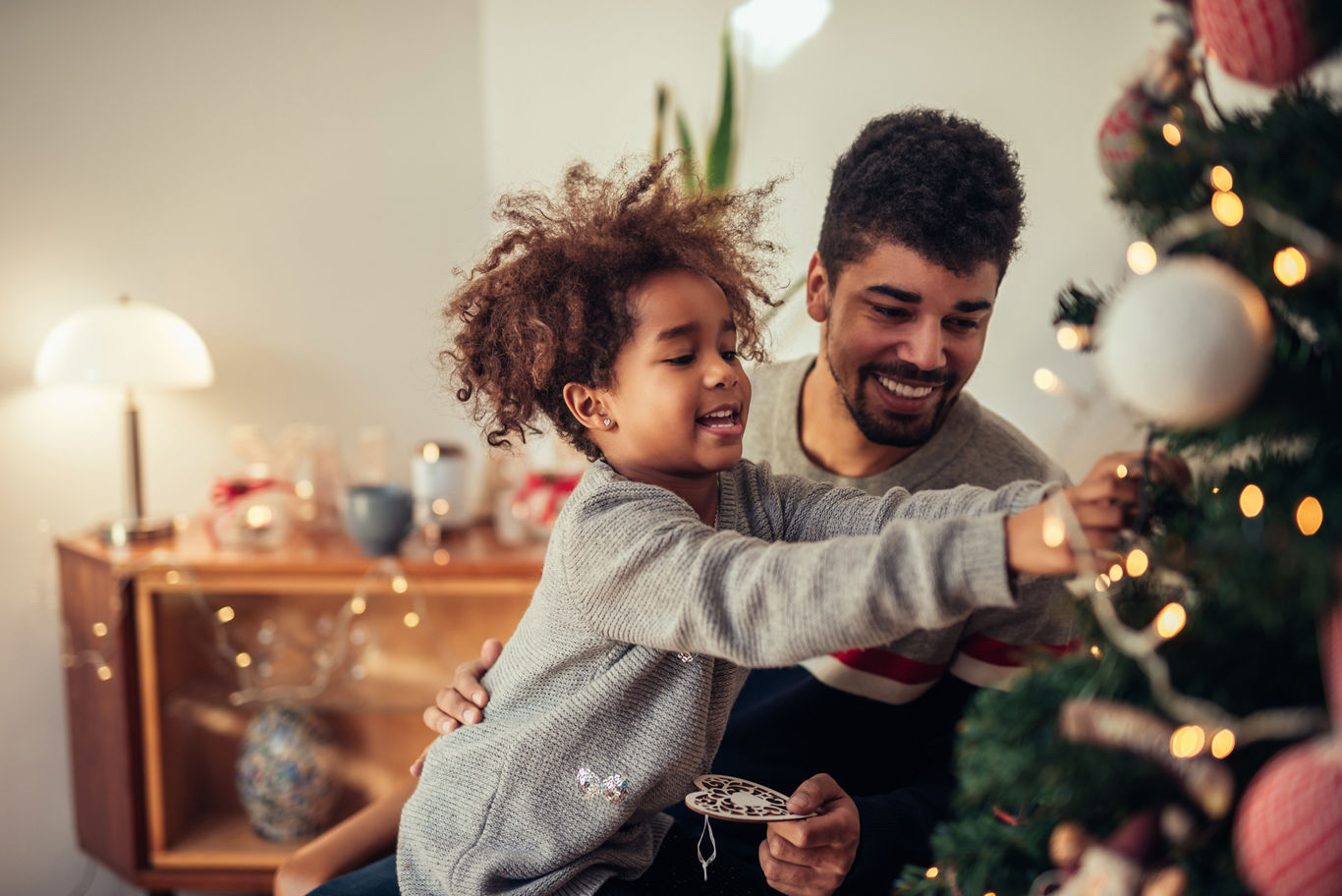 Father and Son Decorating Christmas Tree | Blog | Greystar